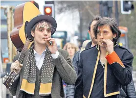  ?? ?? In harmony: main, Carl Barât today; above, with Pete Doherty (left) in 2010