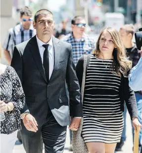  ?? PETER J THOMPSON / NATIONAL POST ?? Peter Khill leaves court in Hamilton earlier this week with his wife Melinda Benko.