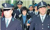  ??  ?? Left, Patrizia Reggiani (centre), during her trial for killing her former husband, Maurizio Gucci, below, in 1998. Right, Ms Reggiani strolls with a parrot in Milan in May 2014