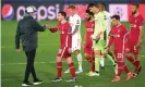  ?? Photograph: Bagu Blanco/BPI/ Rex/Shuttersto­ck ?? Jürgen Klopp greets Andy Robertson at full time of Liverpool’s 3-1 first-leg defeat at Real Madrid.