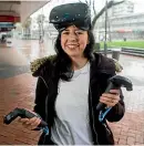  ??  ?? Gretta Rodriguez-Fleming first discovered virtual reality gaming four months ago and fell in love.