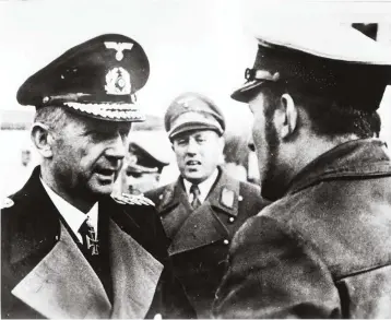  ??  ?? Admiral Karl Dönitz talks to a U-boat commander in December 1944. Intercepti­on of Allied messages aided German attacks – but also masked British success in breaking German ciphers
