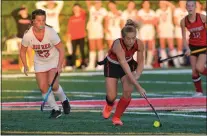  ?? KYLE FRANKOM — TRENTONIAN PHOTO ?? Lawrence’s Talia Schenck, right, moves the ball against Lawrencevi­lle Prep during a MCT semifinal game at Lawrence High. Schenck scored 113 goals this season and finished her career as Mercer County’s all-time top scorer with 244. She is our CVC Player of the Year.