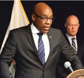  ?? AP FILE PHOTO ?? Illinois Attorney General Kwame Raoul, shown speaking last year in Chicago, contracted COVID-19 and wants people to understand the virus hasn’t gone away.