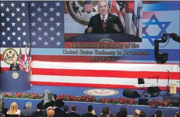  ?? Menahem Kahana AFP/Getty Images ?? ISRAELI Prime Minister Benjamin Netanyahu speaks at the opening of the relocated U.S. Embassy. The embassy move reversed decades of U.S. policy, which left Jerusalem’s status to be settled during peace talks.