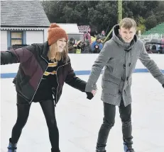  ??  ?? Rosie Boyes and Ben Robinson have fun on the skating rink