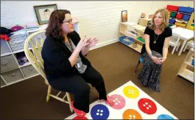  ?? NWA Democrat-Gazette/DAVID GOTTSCHALK ?? Candice Sisemore (left), owner and lead preschool teacher, and Melissa Graham, director, speak Thursday in the preschool classroom at Teeny Tiny Preschool in Fayettevil­le. Classes return today from the Christmas break at the school that opened in...