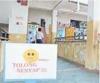  ??  ?? JANGAN BISING: Suasana bilik peperiksaa­n di Sekolah Kebangsaan Dato Traoh, Kota Samarahan.