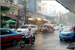  ??  ?? Outside Chabad Bangkok in the monsoon rain