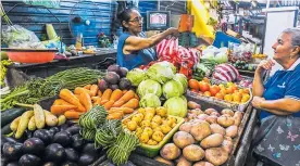  ?? JESÚS RICO ?? Puestos de venta de verduras ubicados en el mercado de Barranquil­la.