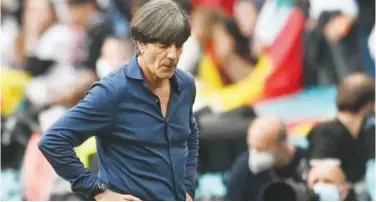  ??  ?? ↑
Germany’s coach Joachim Loew reacts during their Euro round of 16 football match against England in London on Tuesday.