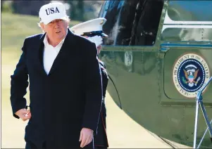  ?? AP PHOTO ?? President Donald Trump steps off Marine One on the South Lawn as he arrives at the White House in Washington on Sunday.