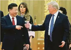  ?? FOTO REUTERS ?? Prezidenti. Si Ťin-pching a Donald Trump hledají dohodu.