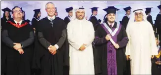  ?? ?? Dr. Salman Al-Lafi (center), Sadiq Al Mutawa (right), Simon Amura, Paul Shropshire handing BSK graduate Wisam Emad (second from right) class of ‘22 certificat­e.