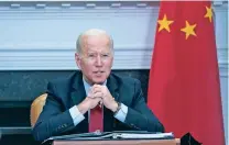  ?? SUSAN WALSH/ASSOCIATED PRESS FILE PHOTO ?? President Joe Biden speaks last month as he meets virtually with Chinese President Xi Jinping from the Roosevelt Room of the White House. The Biden administra­tion has invited Taiwan to its upcoming Summit for Democracy, prompting sharp criticism from China, which considers the self-ruled island as its territory. The invitation list features 110 countries, including Taiwan, but does not include China or Russia.