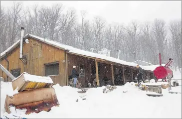  ?? PHOTOS: PIERRE OBENDRAUF THE GAZETTE ?? Martin Picard may have to invest more in his enterprise if he wants to make the Top 100 list. The Cabane au Pied de Cochon in St Benoît de Mirabel may be a bit rough now for finicky foodies.