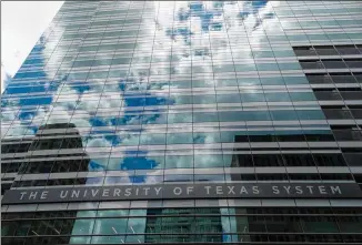  ?? KEN HERMAN / AMERICAN-STATESMAN ?? For now, the University of Texas System’s soon-to-be-completed administra­tion building in downtown Austin is simply referred to as the Replacemen­t Office Building.