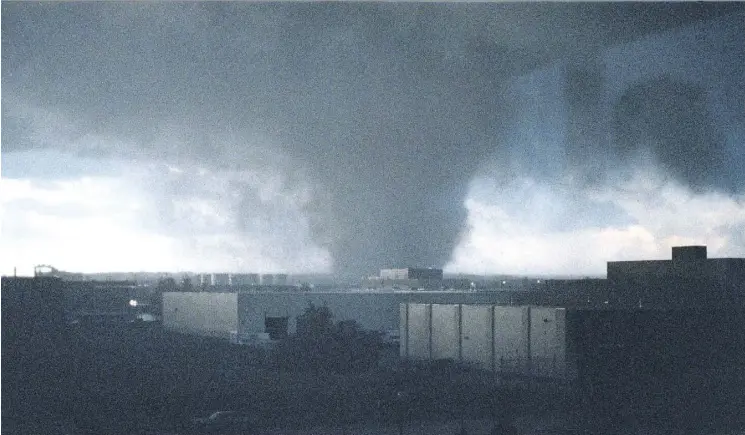  ?? PETER CUTLER/FILE ?? This image from July 31, 1987, captures the magnitude of the massive tornado that tore through the city near 34 Street and 94 Avenue. The twister killed 27 people.