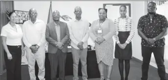  ?? ?? Minister of Labour, Joseph Hamilton (fourth from right) at the meeting (Ministry of Labour photo)