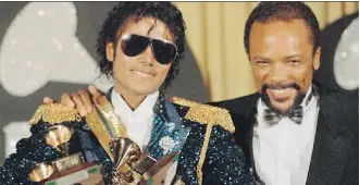  ?? THE ASSOCIATED PRESS/FILES ?? The late Michael Jackson, left, and Quincy Jones collaborat­ed on hits like Thriller.
