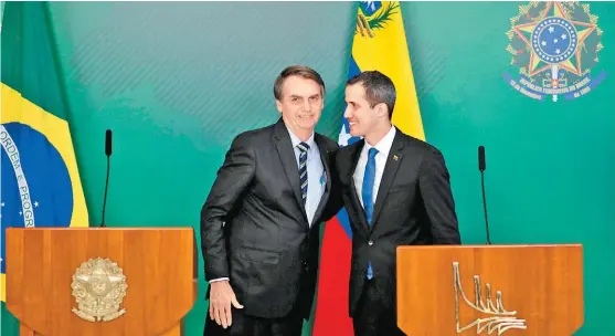  ?? REUTERS ?? El ejecutivo brasileño, Jair Bolsonaro, recibió ayer a Juan Guaidó en Brasilia.