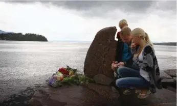  ?? JEFF J. MITCHELL/GETTY IMAGES FILE PHOTO ?? Mourners remember victims of the July 24 attack in Utoya and Oslo. A play on the subject has drawn criticism.