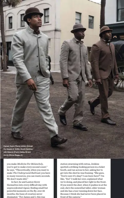  ??  ?? Caesar (Aaron Pierre) strides through the streets of Griffin, South Carolina, with Deacon (Frank Oakley III) and Jacob (Stevie Baggs Jr).