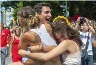  ?? R. JEANETTE MARTIN FILE PHOTO ?? Almost a year to the day since Justin Trudeau was mobbed at Vancouver Pride, the love affair with the prime minister remains intense.