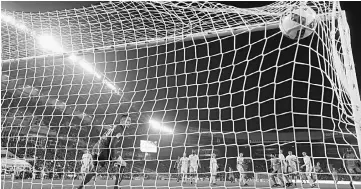  ??  ?? Cavani scores a goal during the French L1 football match between Nantes and Paris Saint-Germain at the Beaujoire stadium of Nantes, western France. — AFP photo