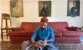  ?? Shah Meer Baloch/The Guardian ?? Artist Zulfikar Ali Bhutto sews an Indus River dolphin into a textile work. Photograph: