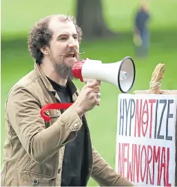  ?? Picture: Gareth Jennings. ?? Daniel Clark from Dundee used his speech at the Balgay Park protest to condemn mandatory vaccinatio­ns and social distancing measures.