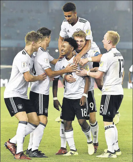  ?? MOHD ZAKIR/HT PHOTO ?? Germany’s John Yeboah (centre) celebrates after scoring against Colombia during their U17 World Cup match on Monday.