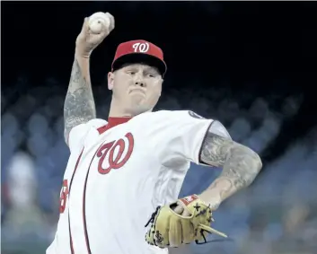  ?? MANUEL BLACE CENETA/AP FILES ?? The Toronto Blue Jays signed right-hander Mat Latos to a minor-league deal Thursday with an invitation to majorleagu­e camp.