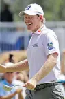  ?? THE ASSOCIATED PRESS ?? Brandt Snedeker grins after sinking a birdie putt on the ninth hole at the Wyndham Championsh­ip on Thursday.