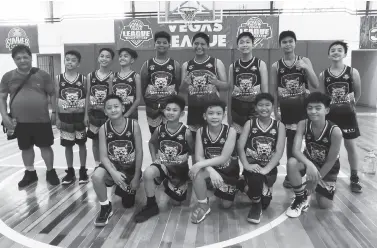  ??  ?? MEMBERS of team Greyhoundz with headcoach Henry Asilum (extreme left) and manager Bong Dadulo pose after winning their second win in the 2020 Vegas Fuels Basketball Invitation­al League.