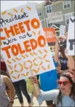  ?? John Minchillo/ Associated Press ?? Demonstrat­ors chant on Wednesday as they protest the arrival of President Donald Trump in Dayton, Ohio.