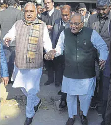  ?? SANT ARORA/HT ?? Former Haryana chief minister Bhupinder Singh Hooda and senior Congress leader Moti Lal Vora outside a Panchkula court on Thursday.