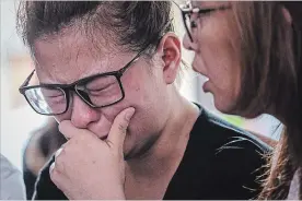  ?? ULET IFANSASTI GETTY IMAGES ?? Ningsi Ayorbaba, weeps as she awaits news of her husband Paul Ferdinan Ayorbaba, a victim of Lion Air flight JT 610.