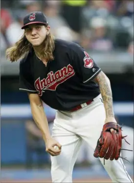  ?? TONY DEJAK — ASSOCIATED PRESS ?? Mike Clevinger reacts after the Reds’ Joey Votto hit a solo home run in the fifth inning on July 9 at Progressiv­e Field.