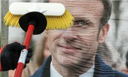  ?? AFP/Getty Images ?? Macron invited his rival to avail himself of a free hearing aid to help him hear his supporters’ chants. Photograph: Sebastien Salom-Gomis/