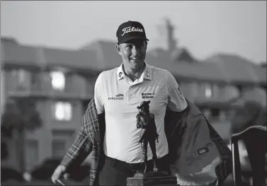  ?? GERRY BROOME/AP PHOTO ?? Webb Simpson poses with the trophy after winning the RBC Heritage on Sunday in Hilton Head Island, S.C.