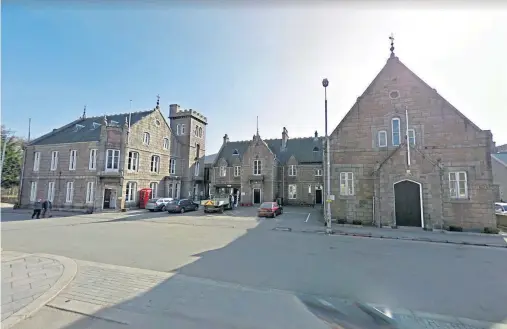  ??  ?? BIG JOB: Work to ‘improve’ the Albert and Victoria Halls in Station Square, Ballater, caused considerab­le damage to the listed building