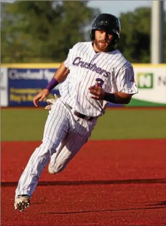  ?? RANDY MEYERS — THE MORNING JOURNAL ?? Parker Norris of the Crushers heads to third against the Washington Wild Things.