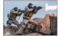  ?? DAVID JAMES — WARNER BROS. ENTERTAINM­ENT VIA AP, FILE ?? This file image released by Warner Bros. Entertainm­ent shows Geoff Stults, left, and Chris Hemsworth in a scene from “12 Strong.” “