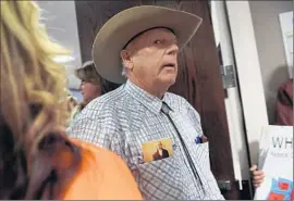  ?? Jason Bean Reno Gazette-Journal ?? “FOR TOO LONG, we’ve allowed the federal government to run over us like we’re nothing,” Bundy said. “Well, we’re not gonna be nothing no more.”
