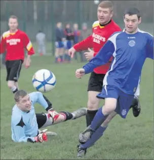  ??  ?? Fassaroe’s Willy Cox watches as his shot goes wide after he had done great work to get past the Carnew keeper Mark Walsh and defender Robert Moules.