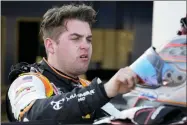  ?? AP PHOTO/CHRIS O’MEARA ?? FILE - Noah Gragson takes off his helmet after a NASCAR Xfinity Series auto race practice Friday, Feb. 18, 2022, at Daytona Internatio­nal Speedway in Daytona Beach, Fla. The star Xfinity Series driver for JR Motorsport­s is in the spotlight again for all the wrong reasons: the poor choices he’s making on track that are slowing Gragson’s career progressio­n.