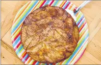  ?? AP PHOTO ?? Apple upside down cornbread from a recipe by Melissa d’arabian.