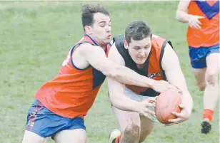  ??  ?? NIlma-Darnum’s Liam Van Eyk wins the race to the ball under pressure from his Buln Buln opponent during the Reserves match.