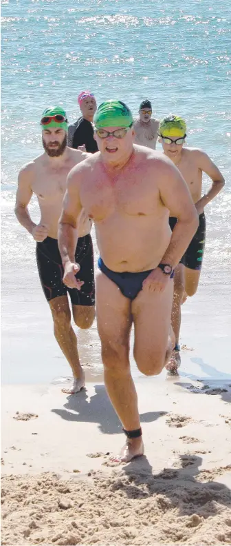  ?? Picture: MIKE BATTERHAM ?? Competitor­s exit the water during the Cooly Classic 1000m at Coolangatt­a.